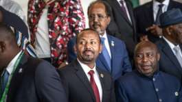 Abiy Ahmed (C), prime minister since 2018, is tipped to retain power in Mays general election.  By Marco Simoncelli (AFP)