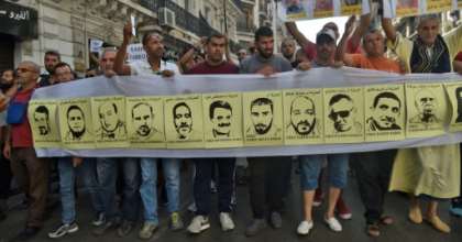Algerians demonstrate against the arrest of dozens of people by the authorities during anti-regime protests. By RYAD KRAMDI (AFP/File)