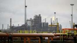 Dangote plans to more than double the refining capacity of its Nigerian operations from 650,000 bpd to 1.4 million bpd -- making it the largest refinery globally, surpassing Indias Jamnagar Refinery.  By TOYIN ADEDOKUN (AFP/File)