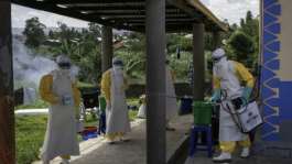 Doctors Without Borders (MSF) personnel prepare for Ebola treatment in the eastern Democratic Republic of the Congo.  By GLODY MURHABAZI (AFP)
