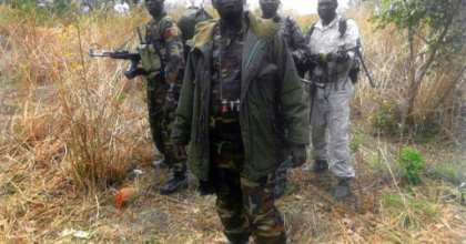 File picture of Abdoulaye Miskine with members of his armed group. The photo, which is undated, was published in April 2013. By - (FDPC/AFP/File)