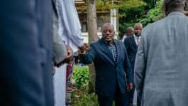 Former president of the Democratic Republic of Congo Joseph Kabila greets traditional leaders after a meeting at one of his residences in Goma on May 30, 2025.  By Jospin Mwisha (AFP/File)