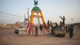 FLA rebels assemble around a roundabout in Kidal on April 26, 2026.  By abdollah Ag Mohamed (AFP/File)