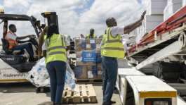 Ground crew load medical supplies onto a UN-operated charter plane bound for Bunia in eastern Democratic Republic of Congo as the World Health Organization (WHO) response to the latest deadly Ebola outbreak.  By Tony KARUMBA (AFP)
