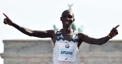 Kipsang, seen here at the Berlin Marathon in 2018, spent the night in jail for breaking Kenya's curfew. By John MACDOUGALL (AFP)