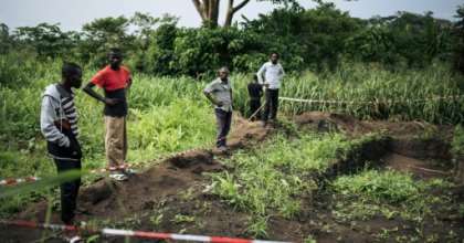 Many of the victims were found in mass graves. By ALEXIS HUGUET (AFP)