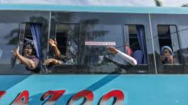 Malawi commissioned buses to bring its citizens home.  By RAJESH JANTILAL (AFP)
