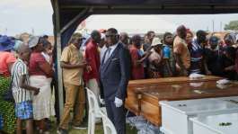 Most people on the overturned ferry were villagers and fish traders, with an unknown number of children also aboard.  By Jekesai NJIKIZANA (AFP)