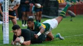 New Zealand wing Will Jordan scores his first try against South Africa in Johannesburg.  By PHILL MAGAKOE (AFP)